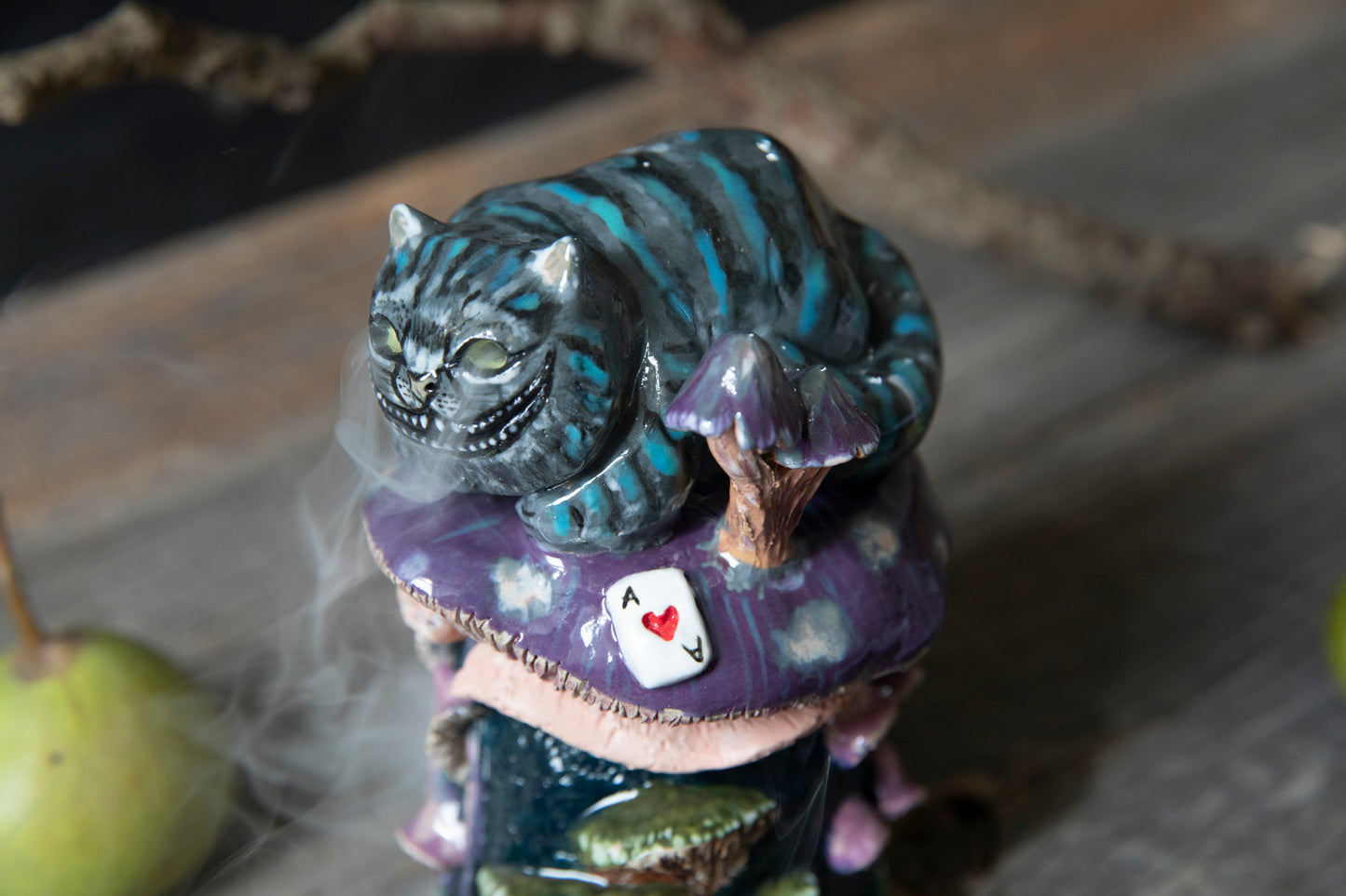 Cheshire smiling Cat from Alice in wonderland on mushroom house ceramic incense holde