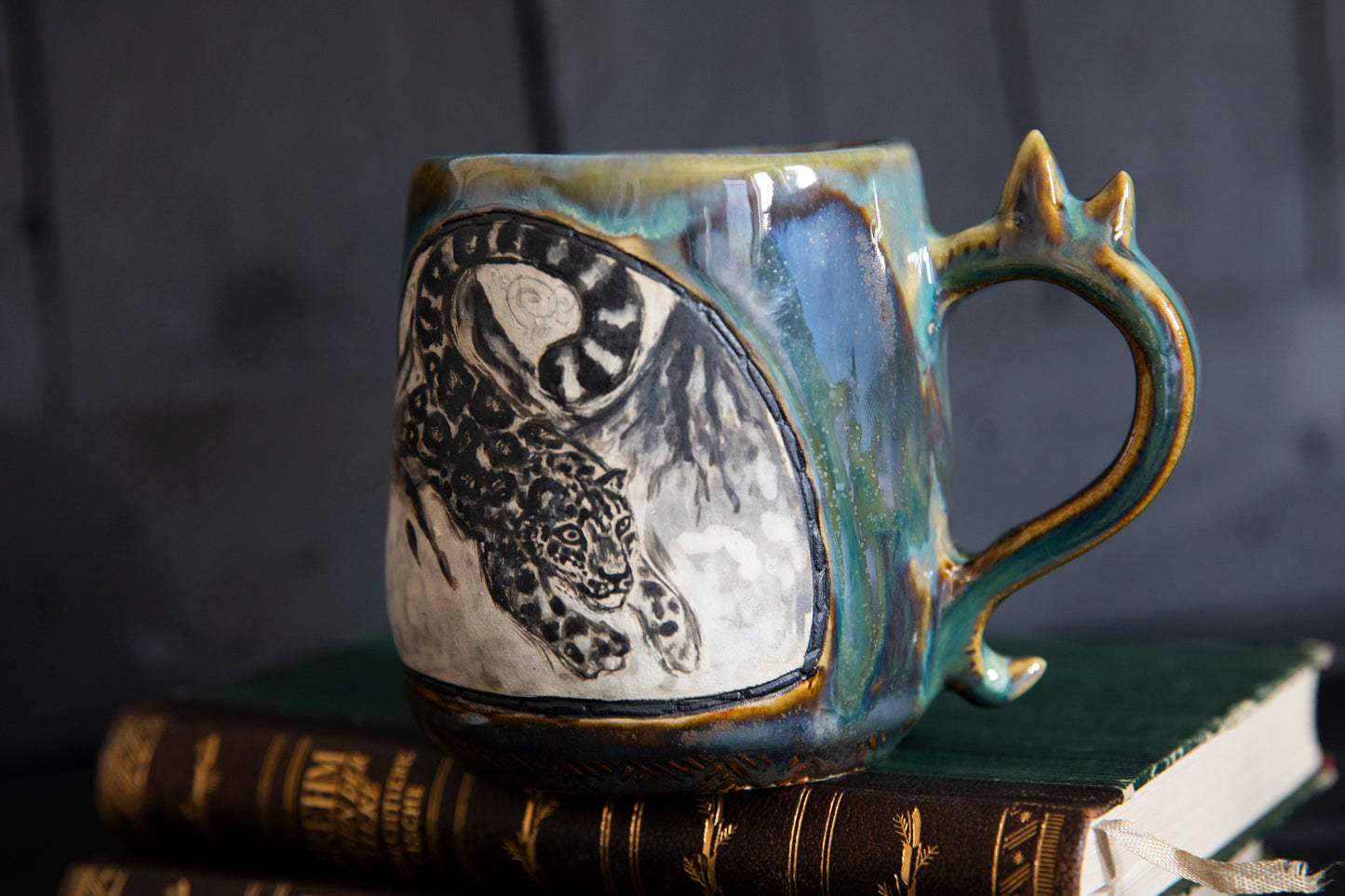 Snow leopard and mountains ceramic mug. Handmade, one of a kind. Unique pottery