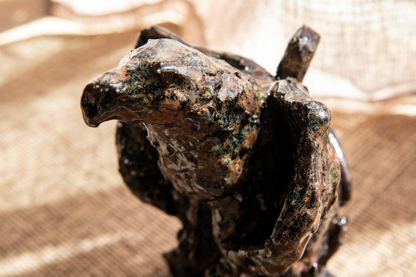 Majestic Ceramic Griffin on black rock, candle holder, incense holder. Griffon.