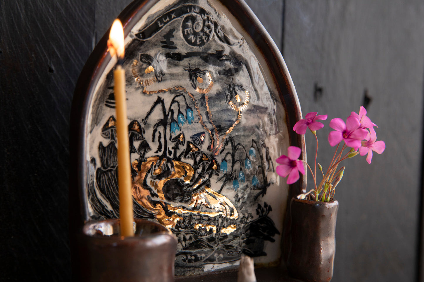 Altar Light in the darkness, firefly and flowers and dog scull