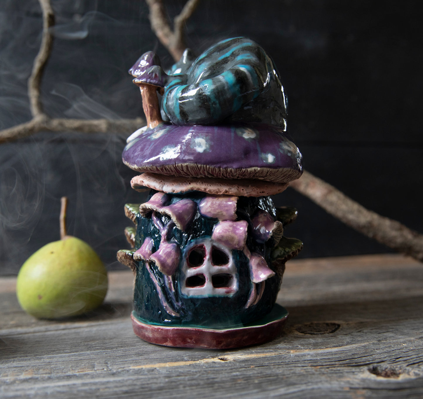 Cheshire smiling Cat from Alice in wonderland on mushroom house ceramic incense holde