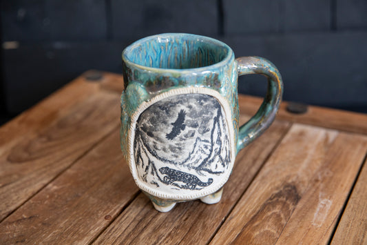 Snow leopard and mountains ceramic mug. Handmade, one of a kind. Unique pottery