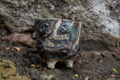 Cute ceramic flower pot with various animals in their burrows underground, unique, one of a kind