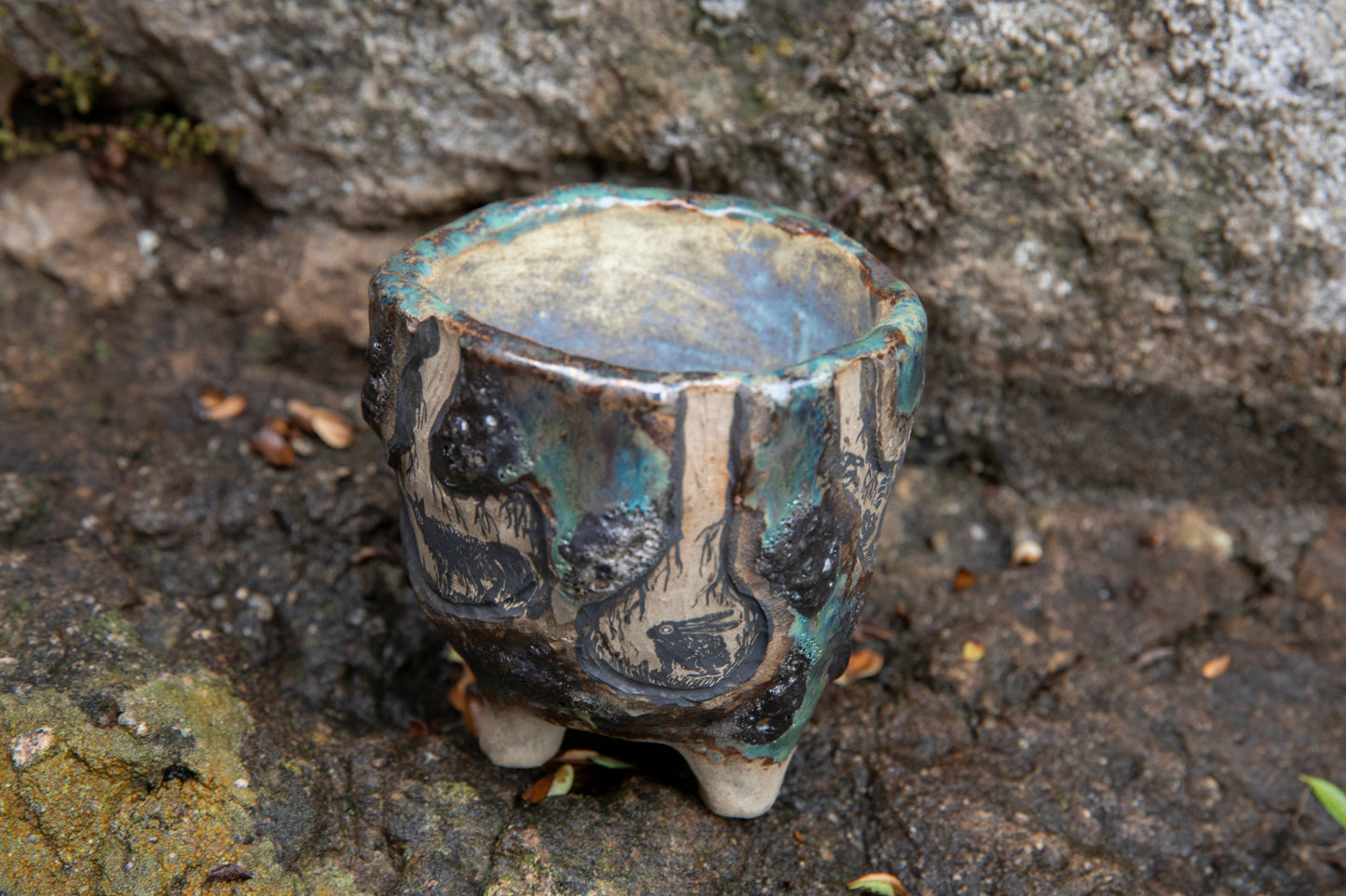 Cute ceramic flower pot with various animals in their burrows underground, unique, one of a kind