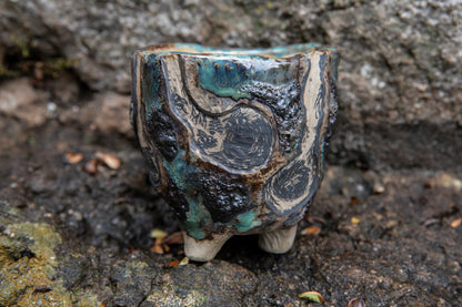 Cute ceramic flower pot with various animals in their burrows underground, unique, one of a kind