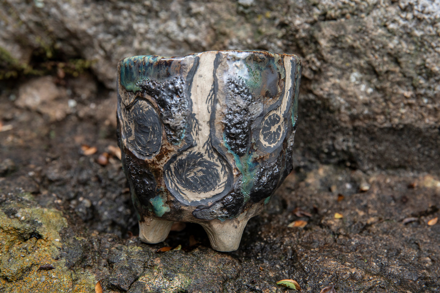 Cute ceramic flower pot with various animals in their burrows underground, unique, one of a kind