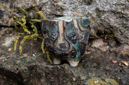 Cute ceramic flower pot with various animals in their burrows underground, unique, one of a kind