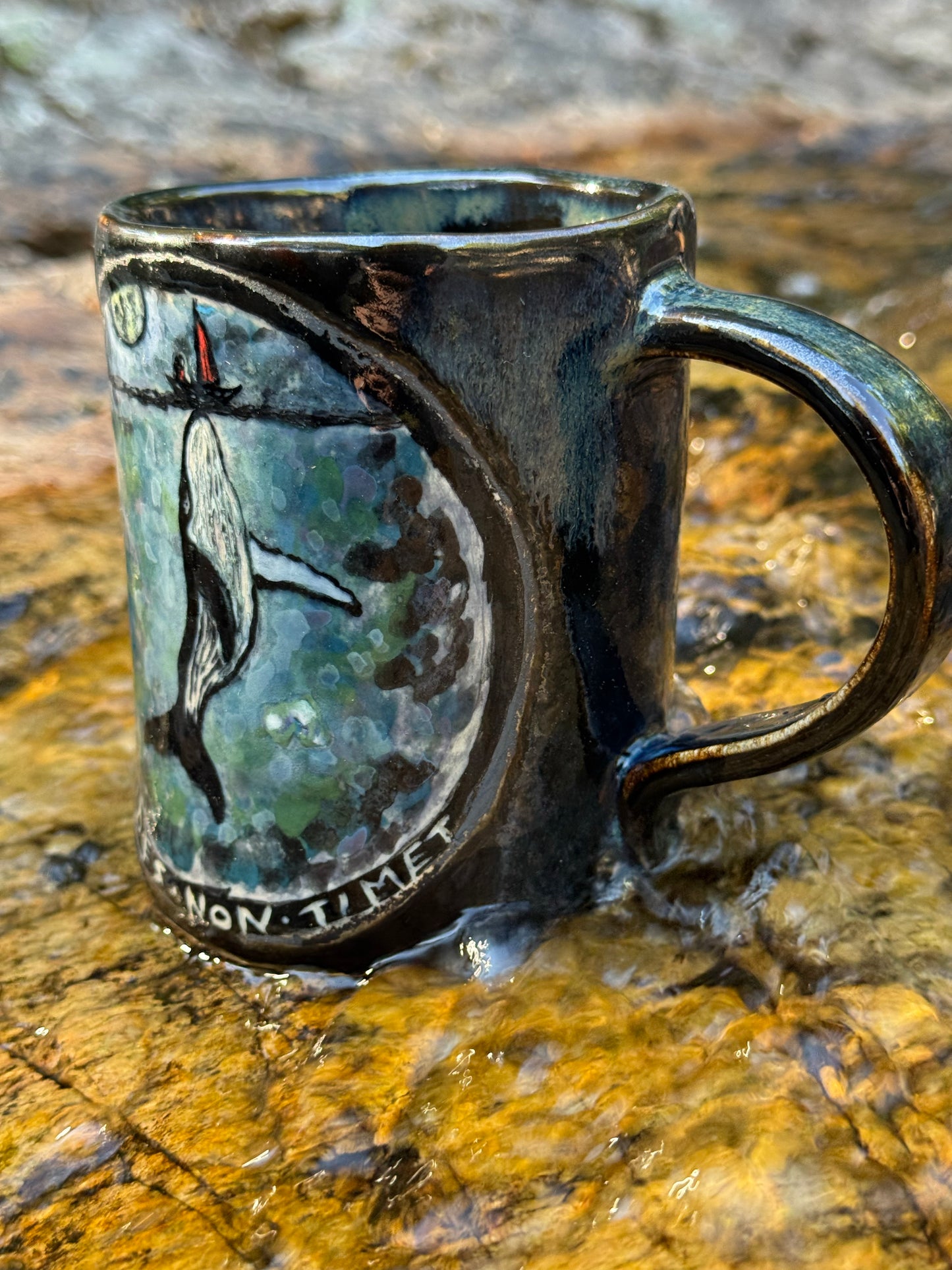 Whale and small boat with little girl in the sea, ceramic mug