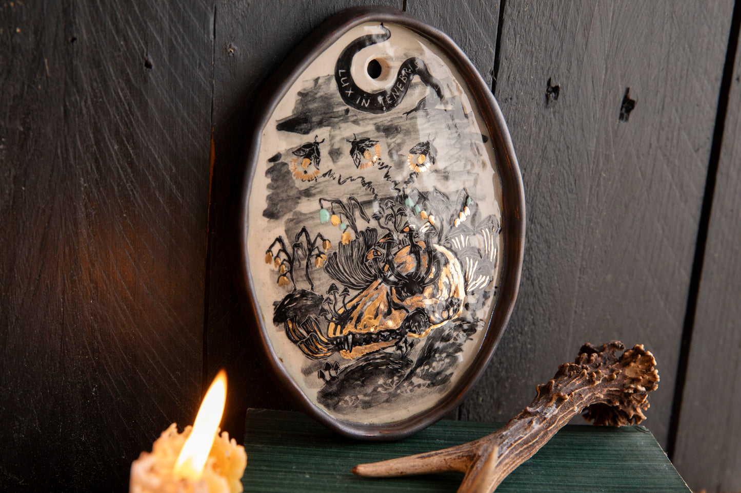 Wall decoration Light in the darkness, firefly and flowers and dog scull