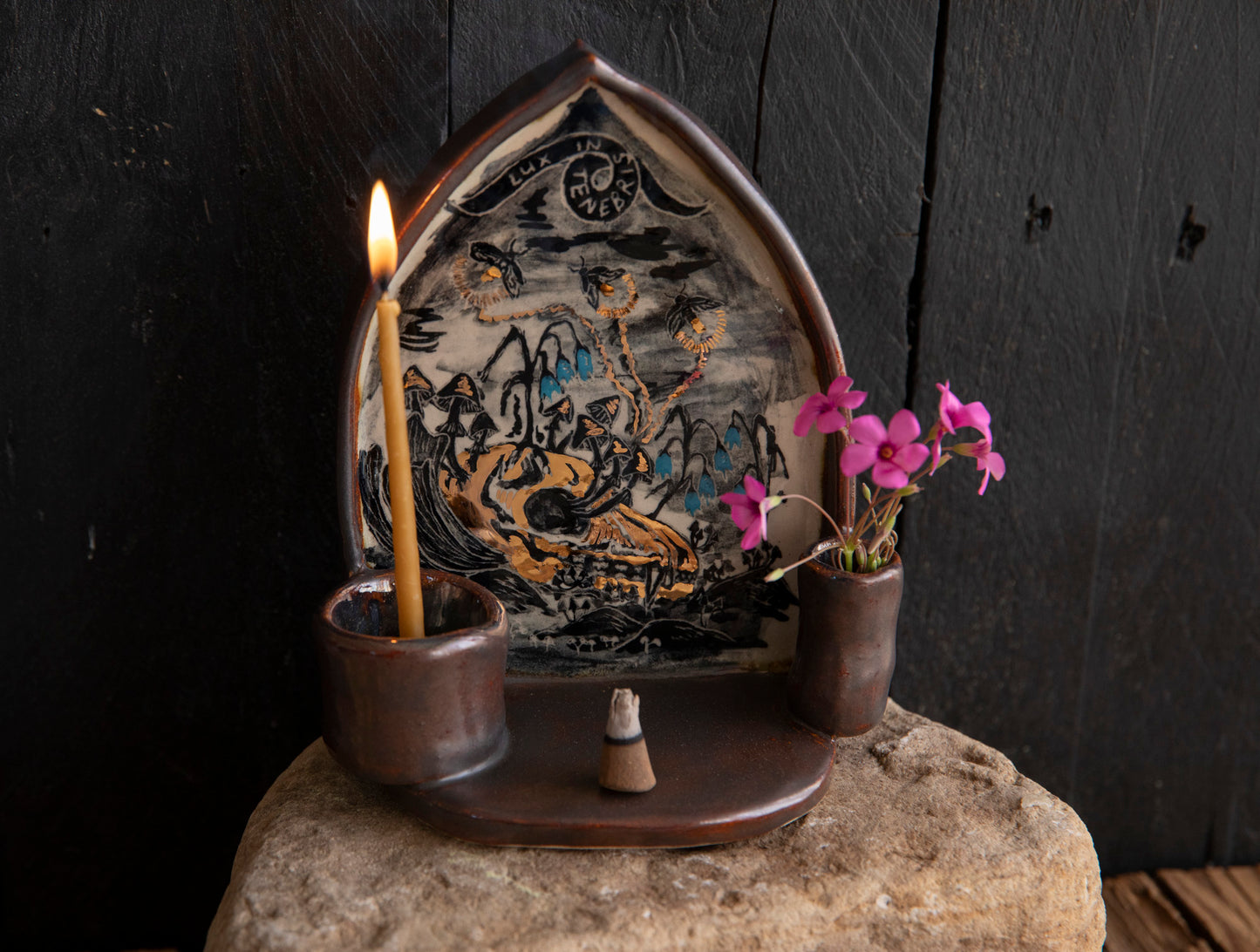 Altar Light in the darkness, firefly and flowers and dog scull