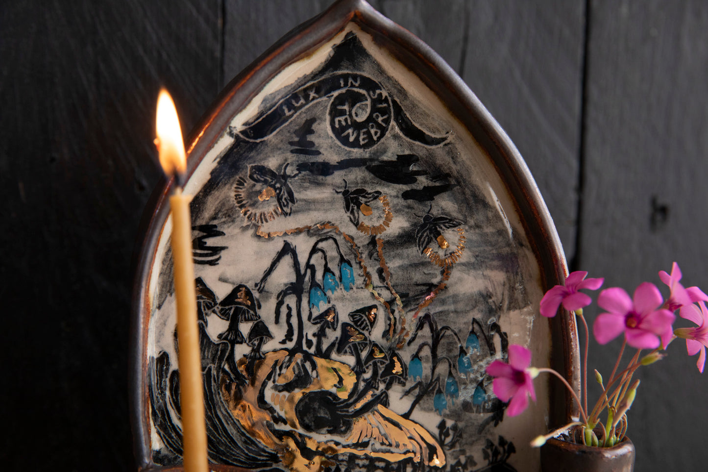 Altar Light in the darkness, firefly and flowers and dog scull