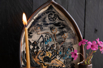 Altar Light in the darkness, firefly and flowers and dog scull