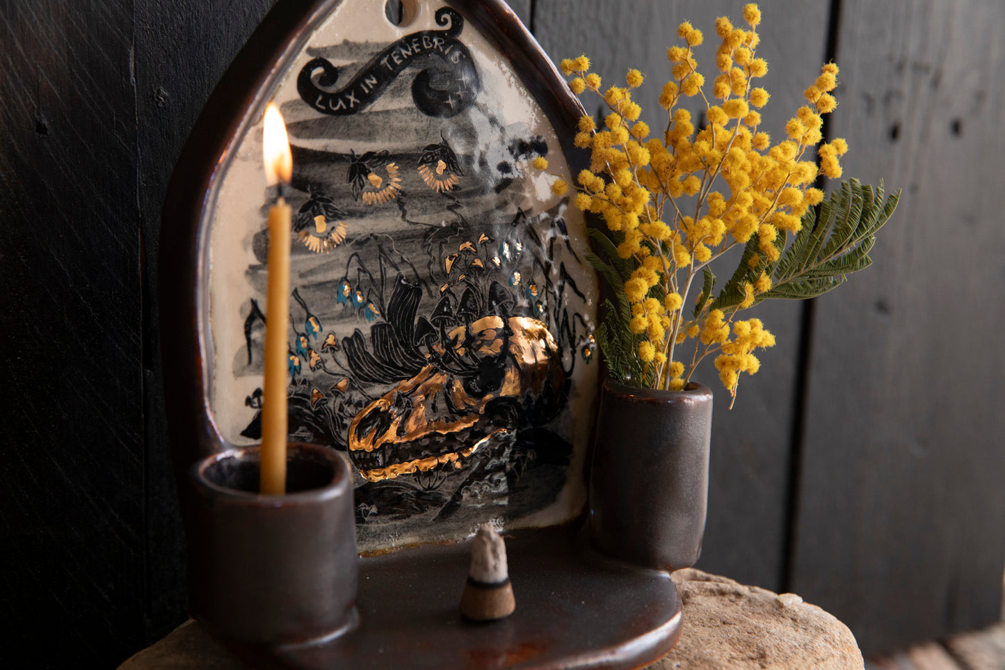 Altar Light in the darkness, firefly and flowers and dog scull