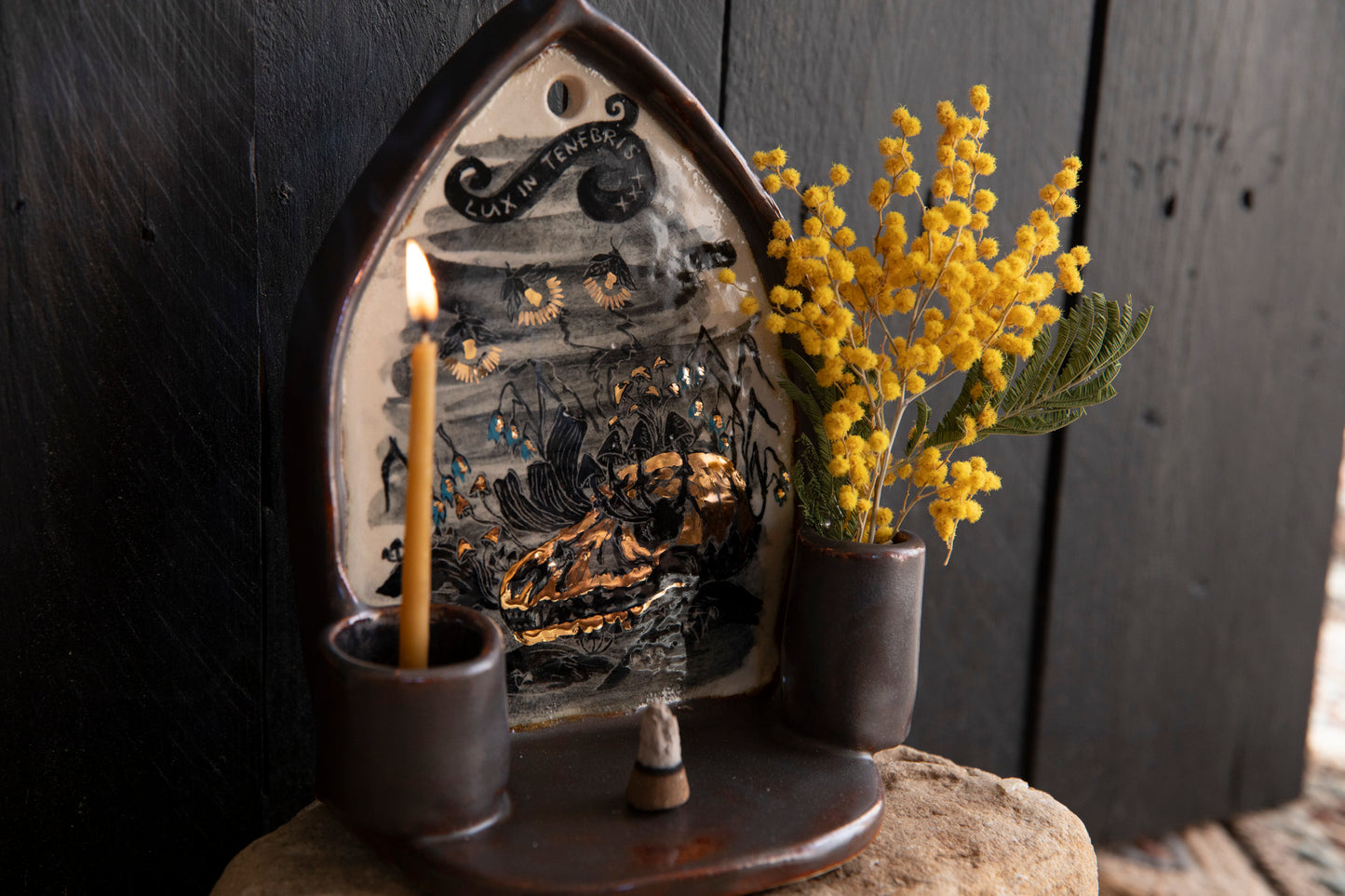 Altar Light in the darkness, firefly and flowers and dog scull