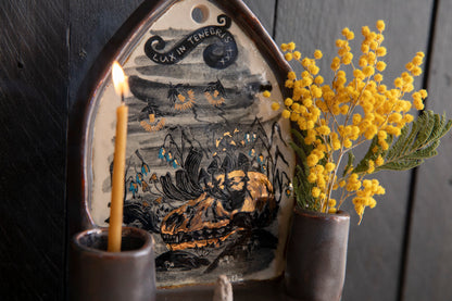 Altar Light in the darkness, firefly and flowers and dog scull