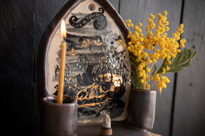 Altar Light in the darkness, firefly and flowers and dog scull