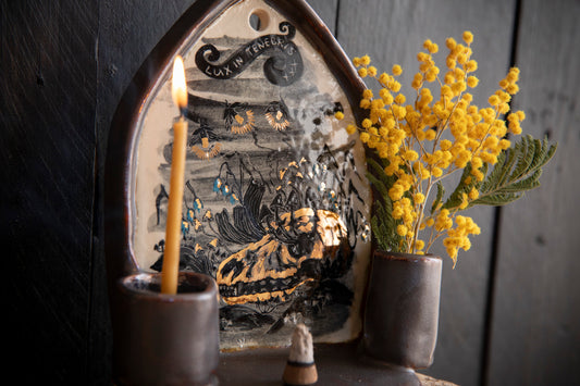 Altar Light in the darkness, firefly and flowers and dog scull