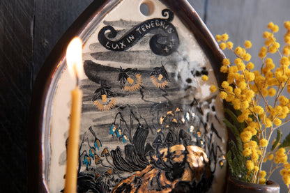 Altar Light in the darkness, firefly and flowers and dog scull